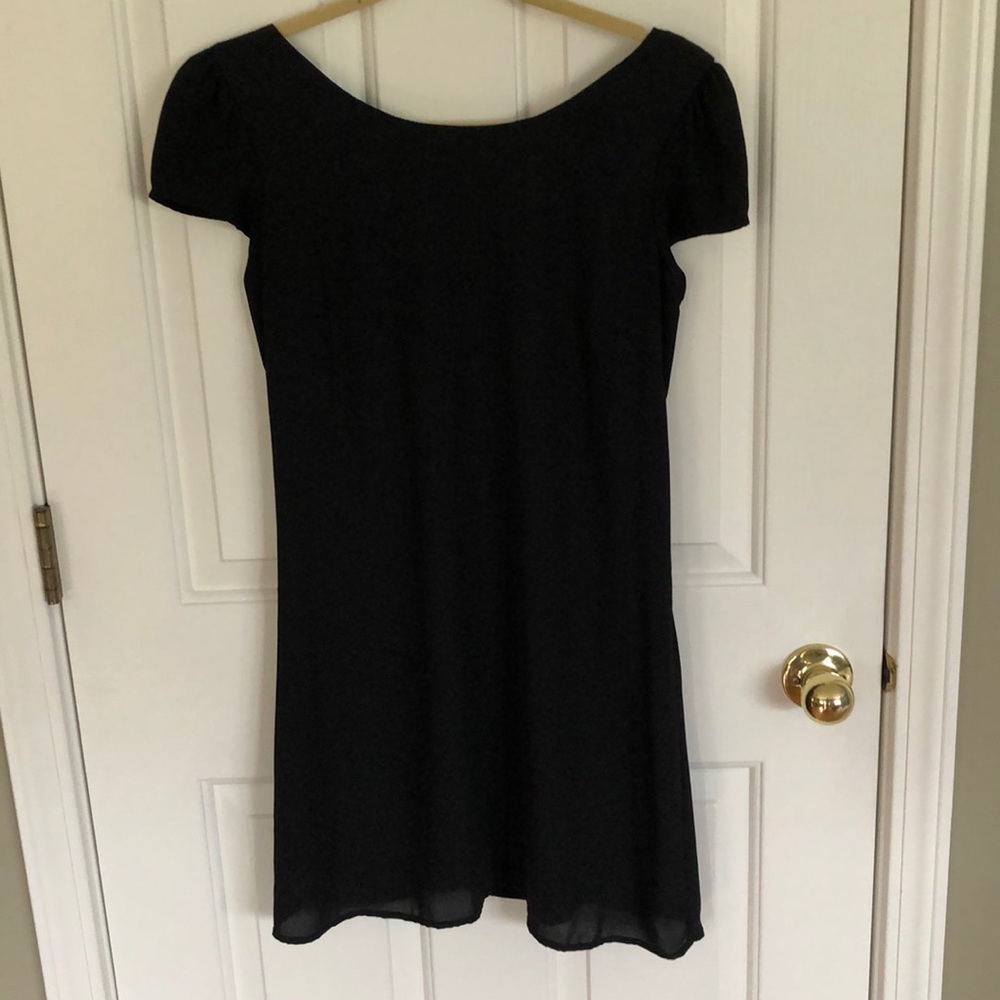 Black dress with crossed back